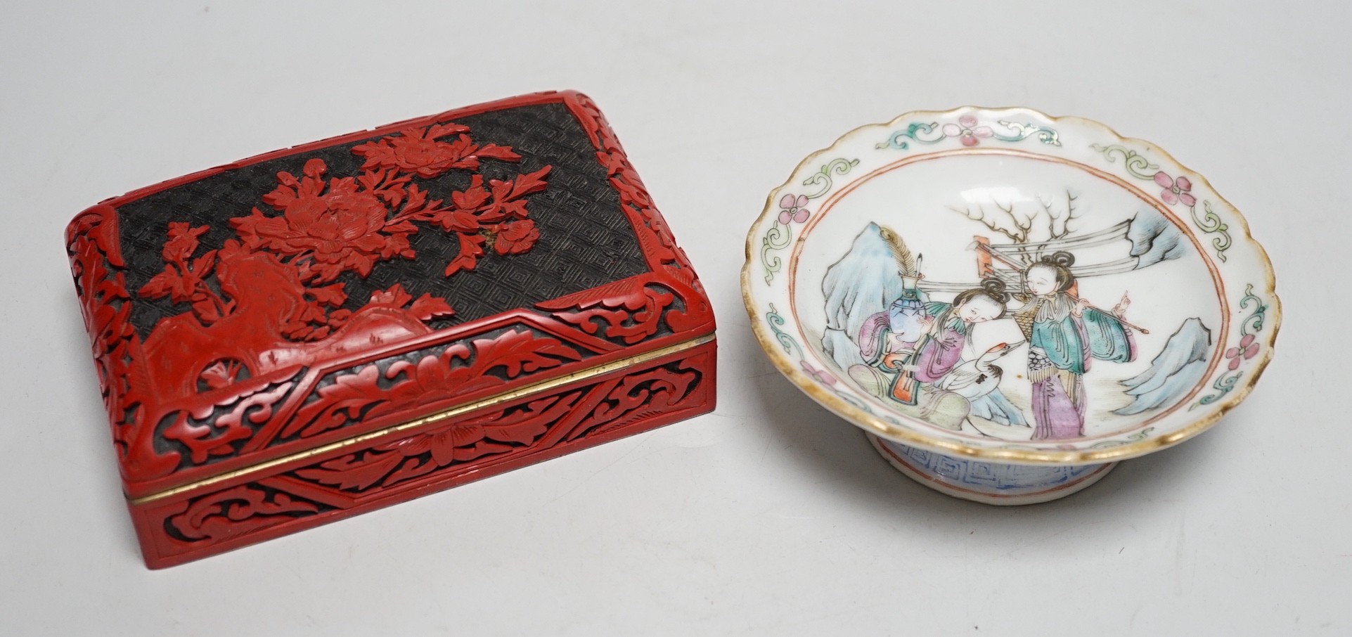 A Chinese cinnabar lacquer cigarette box and a Chinese famille rose stem dish, Tongzhi mark and period